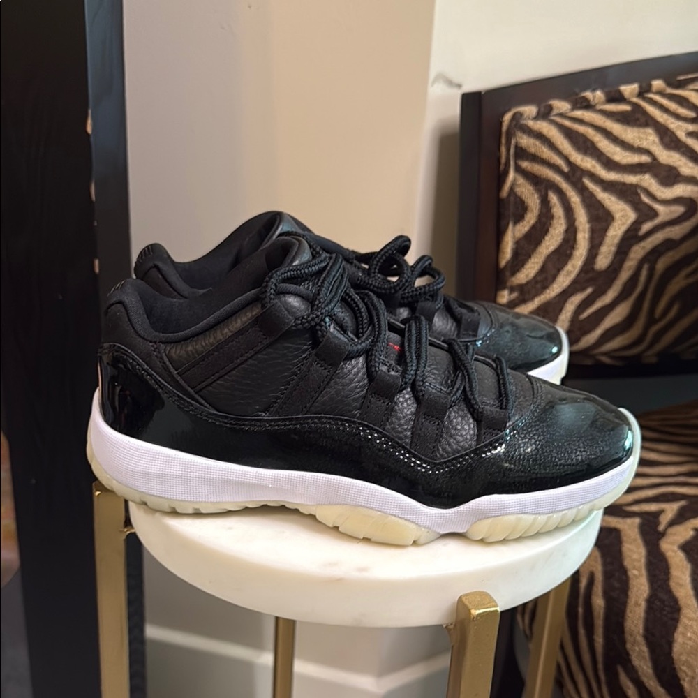 Air Jordan 11’s Black and White Low-Top Sneakers